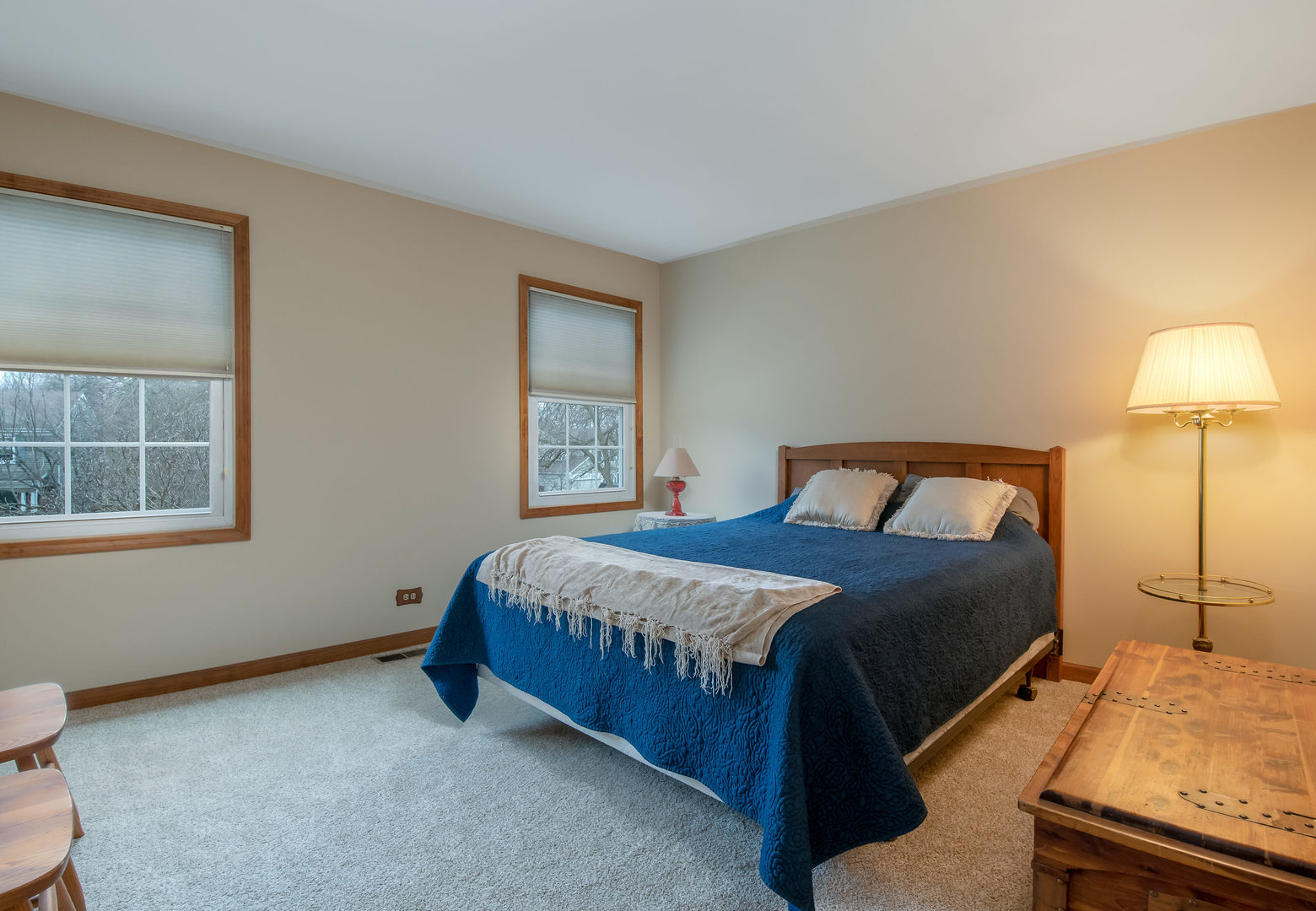 2105 Countryside Circle Naperville, IL 60565 - Photo 20 of 26 a bedroom with a bed and two lamp