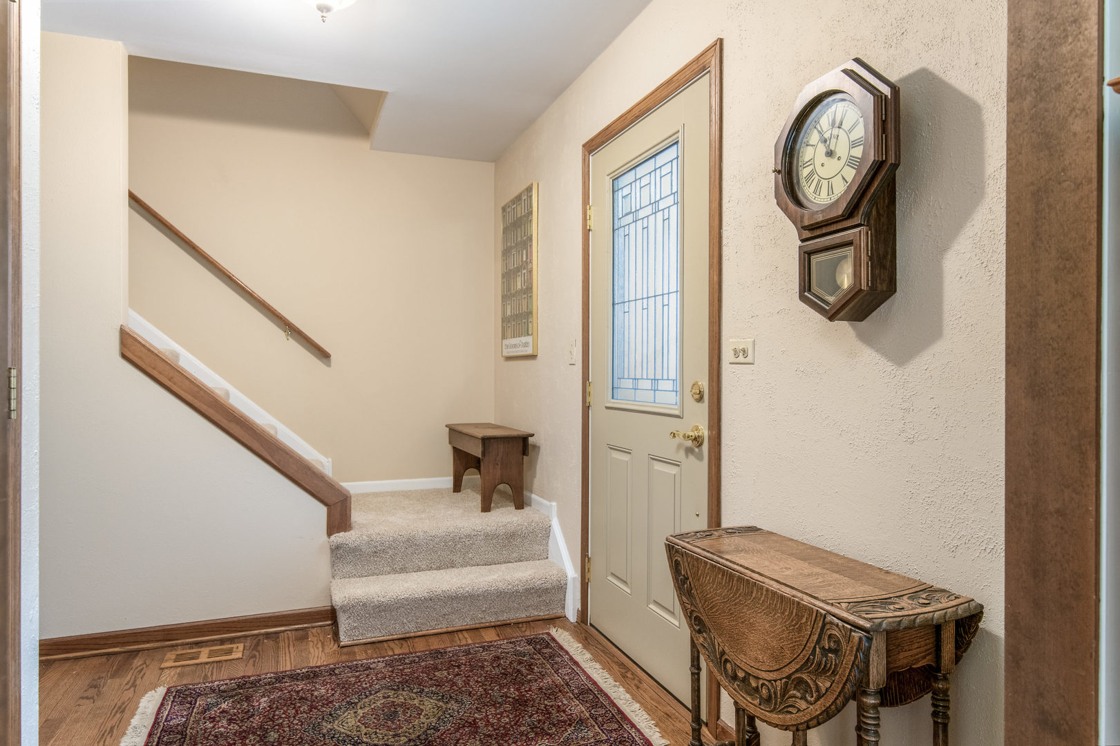 2105 Countryside Circle Naperville, IL 60565 - Photo 3 of 26 a view of entryway with stairs and furniture