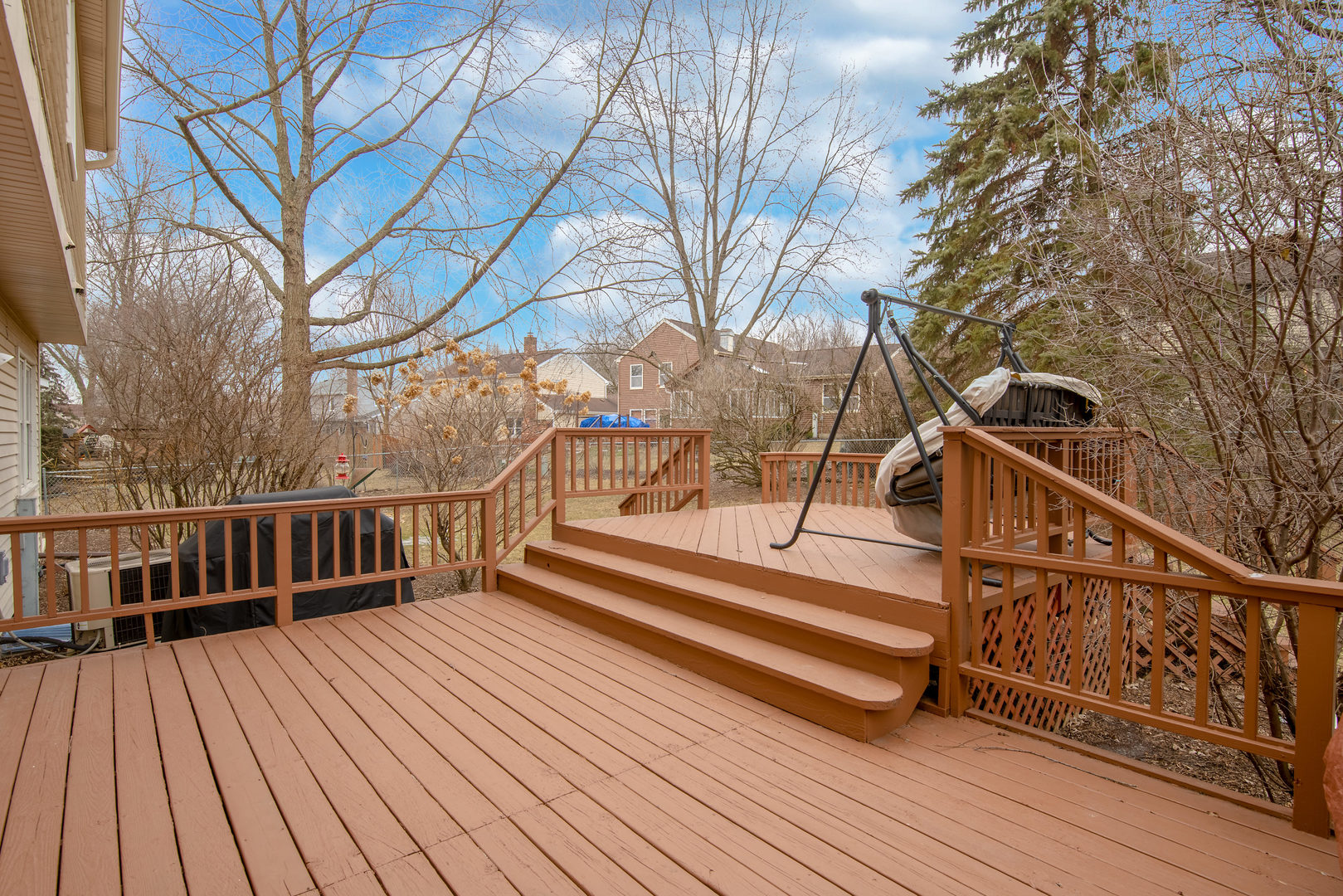 2105 Countryside Circle Naperville, IL 60565 - Photo 26 of 26 a view of backyard with deck and wooden floor