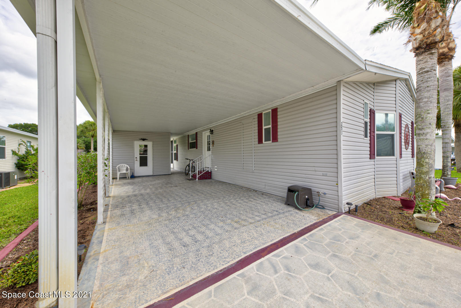 253 Timber Run Way, Unit 309 Cocoa, FL 32926 - Photo 26 of 38 carport
