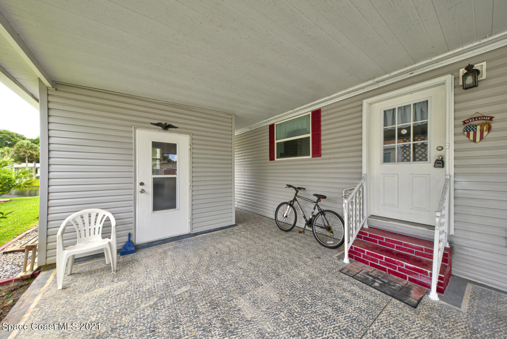 253 Timber Run Way, Unit 309 Cocoa, FL 32926 - Photo 27 of 38 entry & storage shed