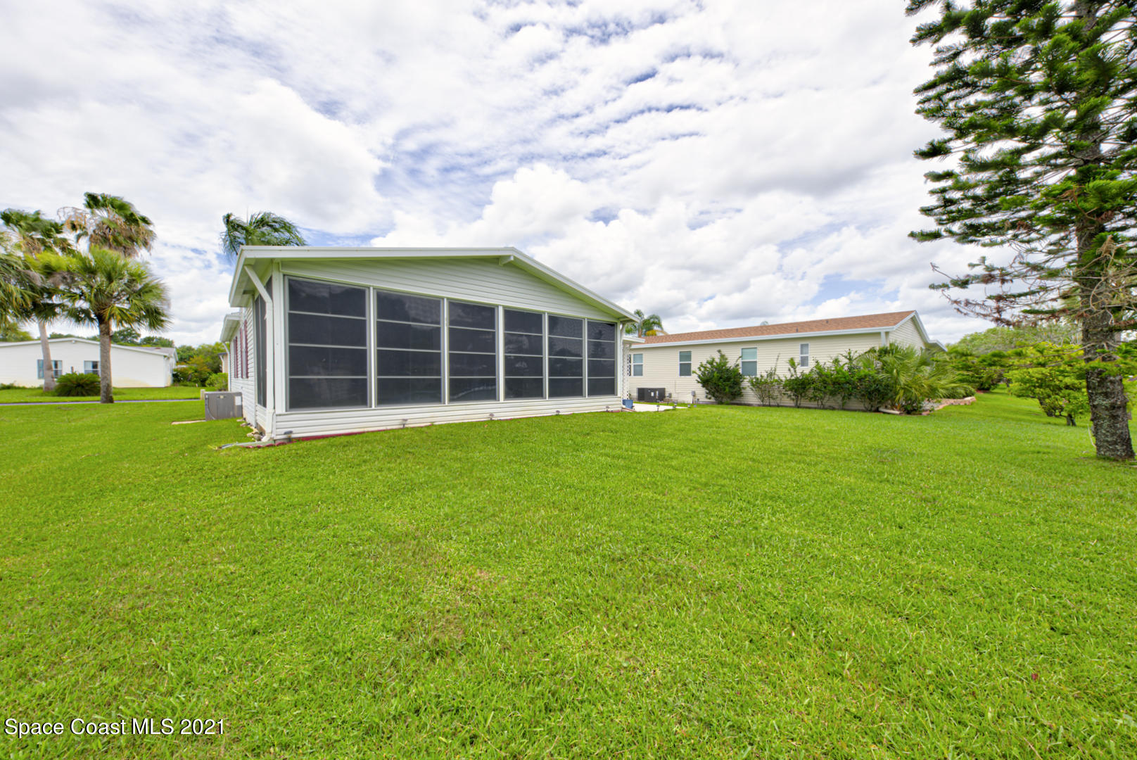253 Timber Run Way, Unit 309 Cocoa, FL 32926 - Photo 36 of 38 back of house left