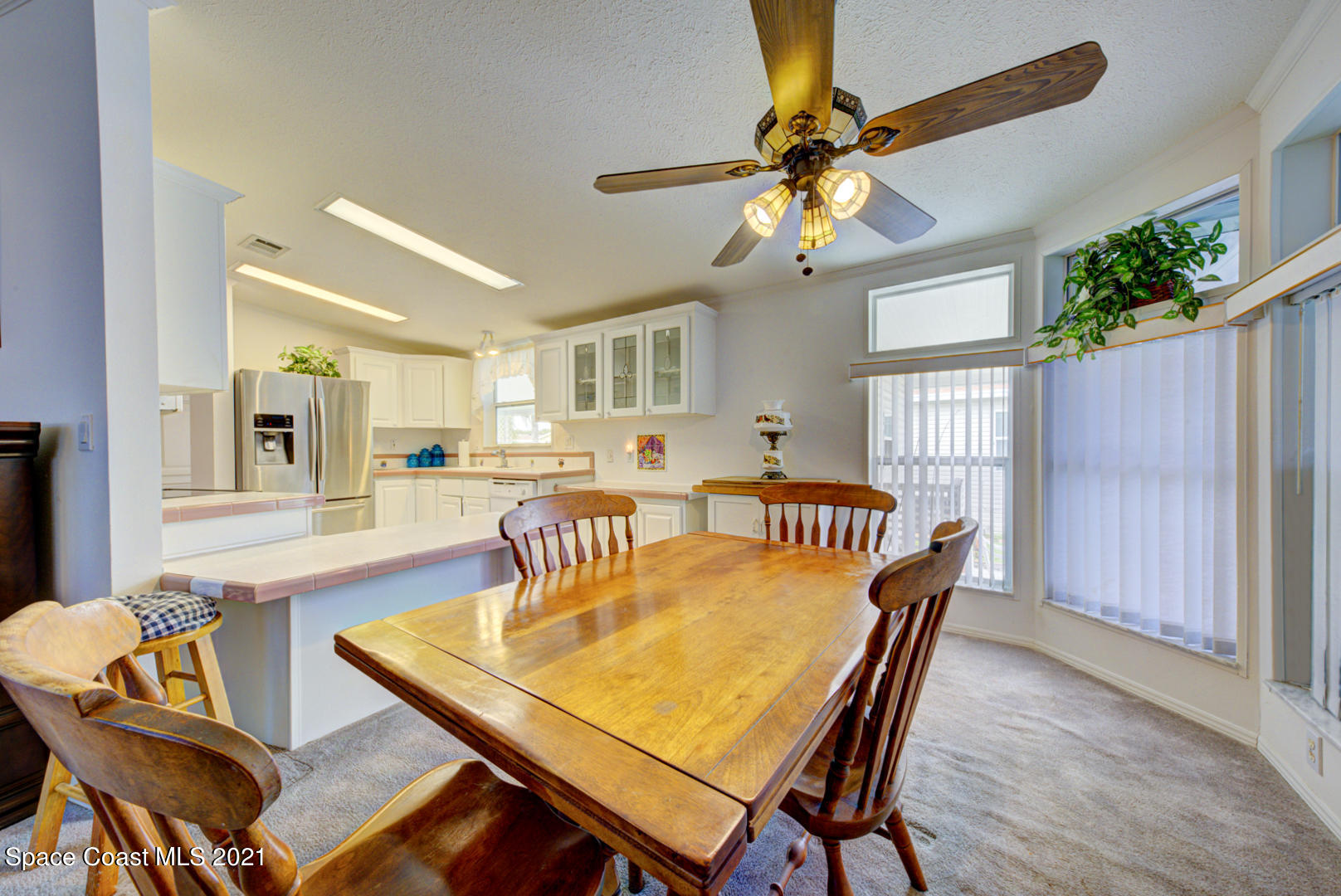 253 Timber Run Way, Unit 309 Cocoa, FL 32926 - Photo 9 of 38 dining room & kitchen