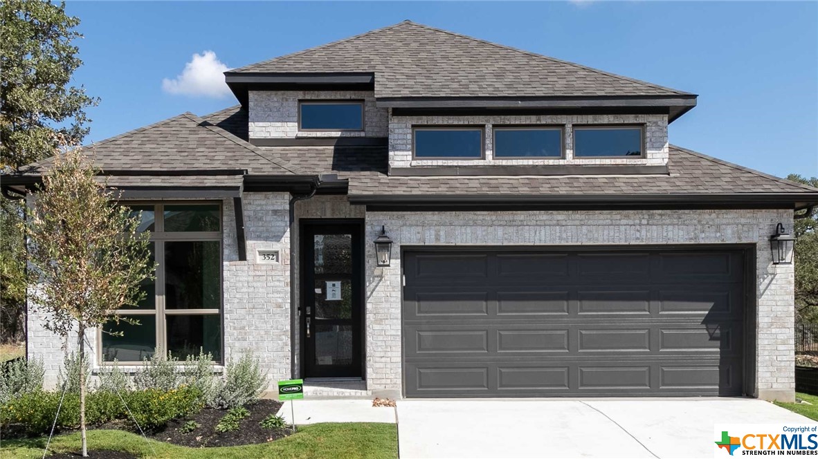 352 Kimble Creek Loop Kyle, TX 78640 - Photo 1 of 1 a house view with a outdoor space