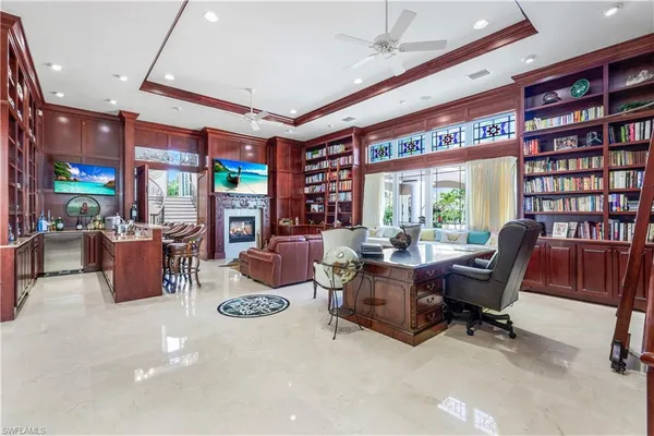 a kitchen with a sink and a large window