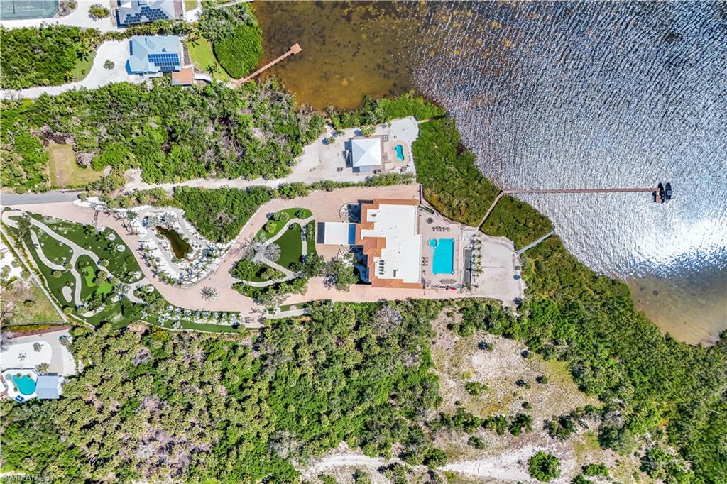 7159 Manasota Key Road Englewood, FL 34223 - Photo 38 of 50 Aerial overview of property's location featuring a pool and a large body of water