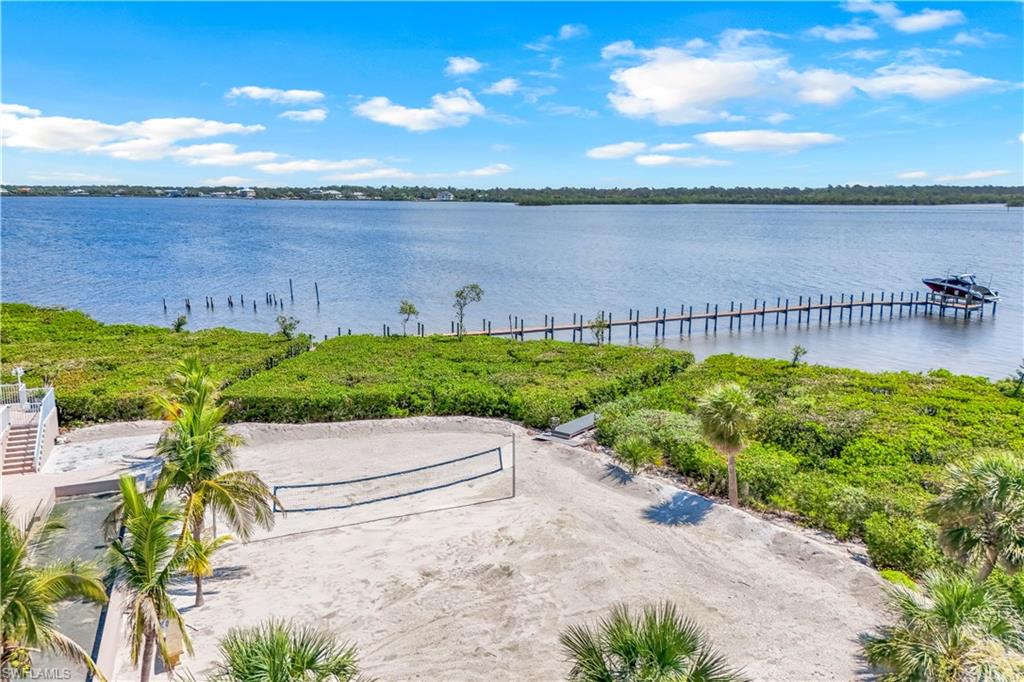 7159 Manasota Key Road Englewood, FL 34223 - Photo 42 of 50 Water view featuring a boat dock