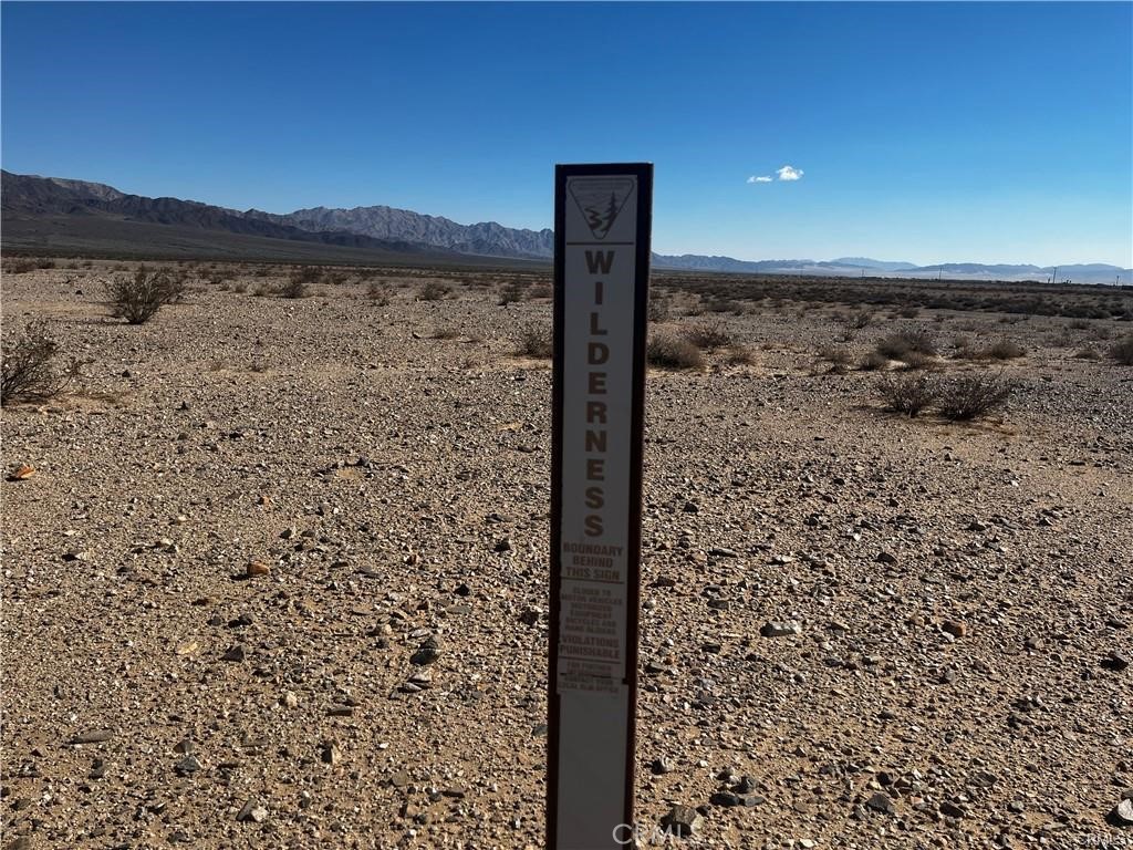 0 Shelton Road Twentynine Palms, CA 92277 - Photo 6 of 6 a bathroom with a shower