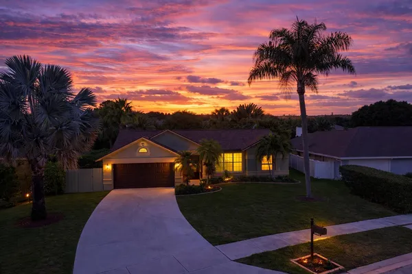 $675,000 | 3663 Woods Walk Boulevard, Wellington, FL 33467