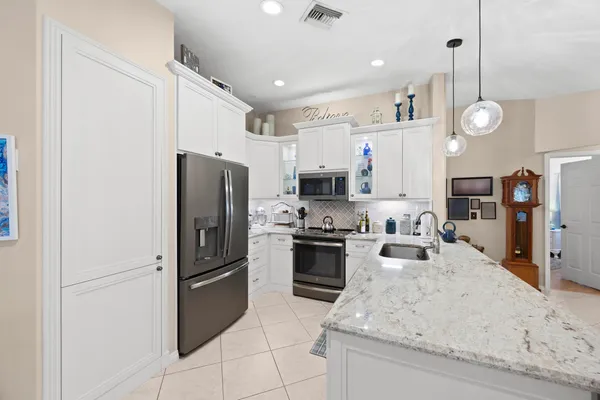 $675,000 | 3663 Woods Walk Boulevard, Wellington, FL 33467
