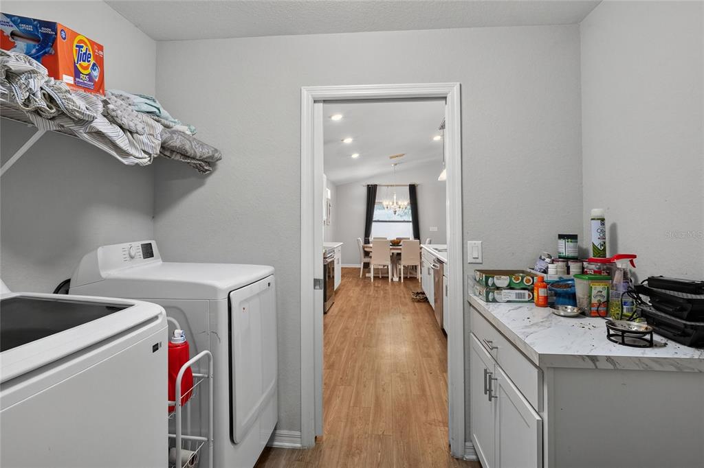 6360 Gardner Road Lakeland, FL 33813 - Photo 18 of 47 a utility room with dryer and washer