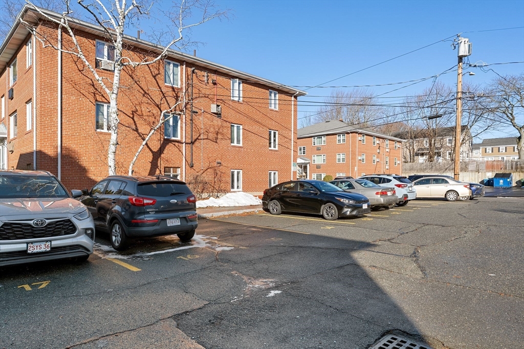 133 Warren Street, Unit 3 Watertown, MA 02472 - Photo 6 of 22 a view of a car parked in front of a building