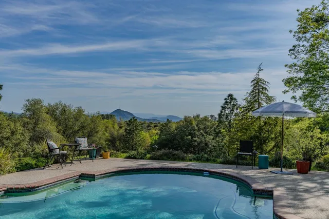 a view of a terrace with a yard