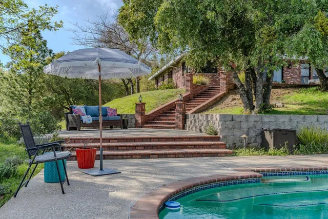 a view of street with sitting area
