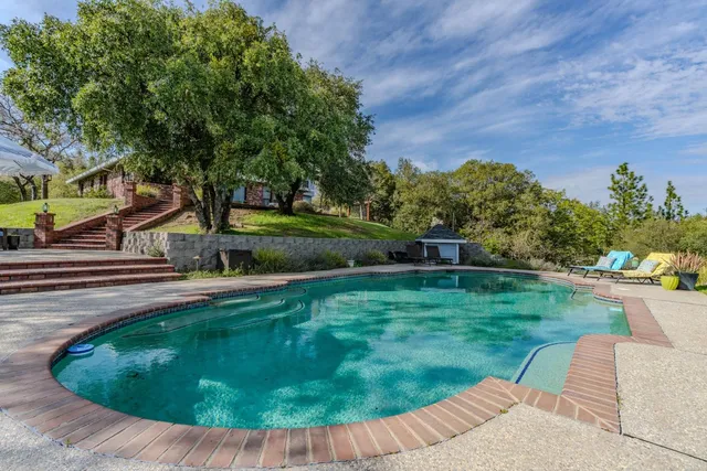 a view of a backyard with a garden