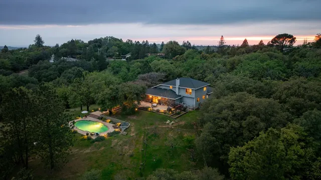a aerial view of a house with a garden