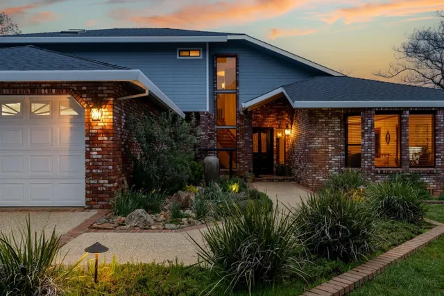 a backyard of a house with lots of green space
