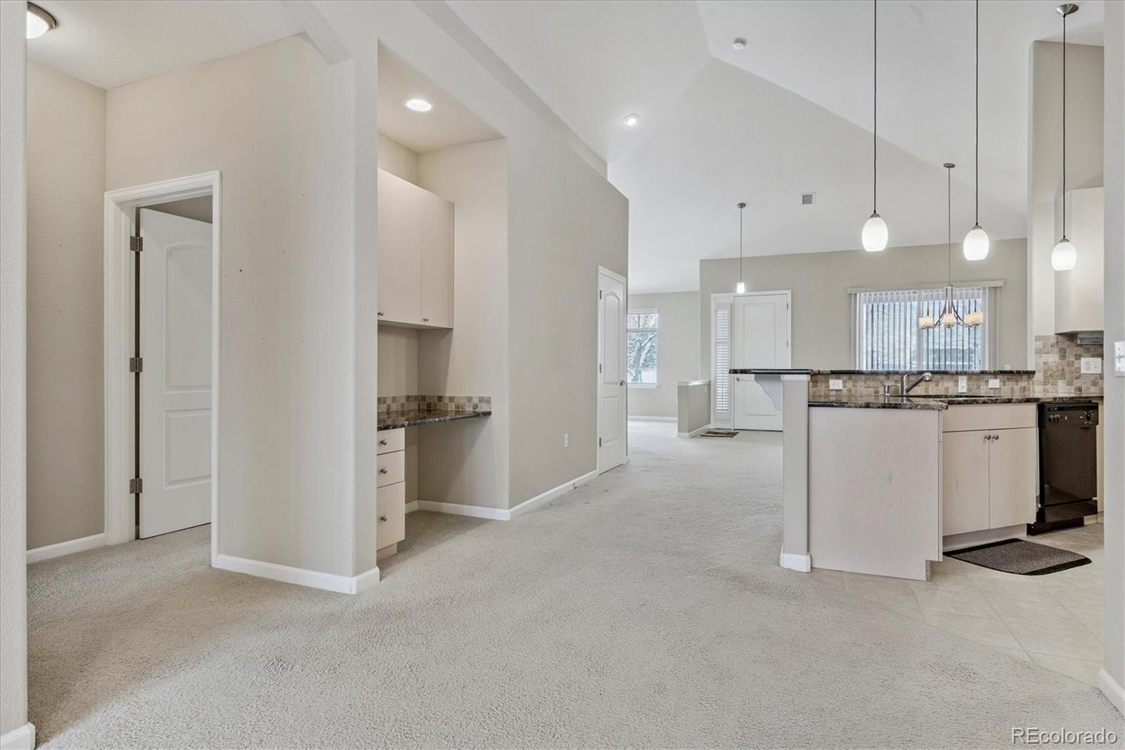 8650 Gold Peak Drive, Unit A Highlands Ranch, CO 80130 - Photo 18 of 47 a view of a kitchen with an oven