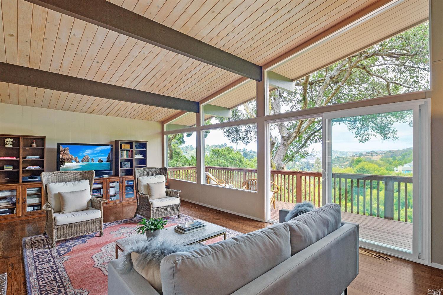761 Bay Road Mill Valley, CA 94941 - Photo 1 of 1 a living room with furniture and a large window