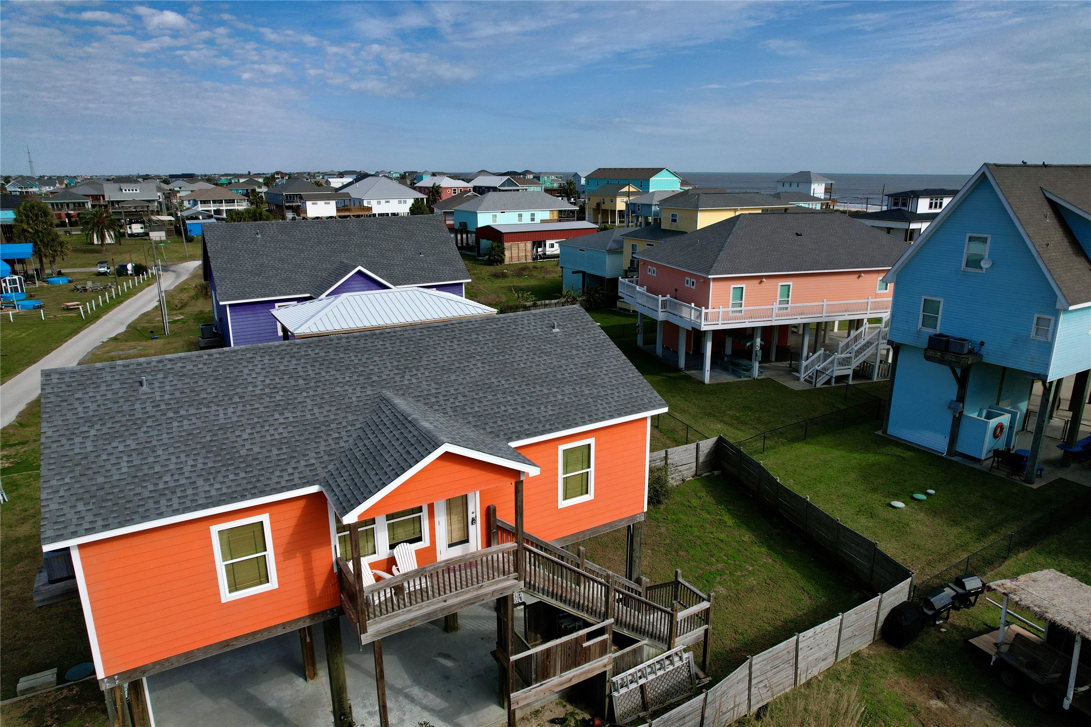 1830 Croaker Lane Crystal Beach, TX 77650 - Photo 1 of 21 an aerial view of a house with swimming pool
