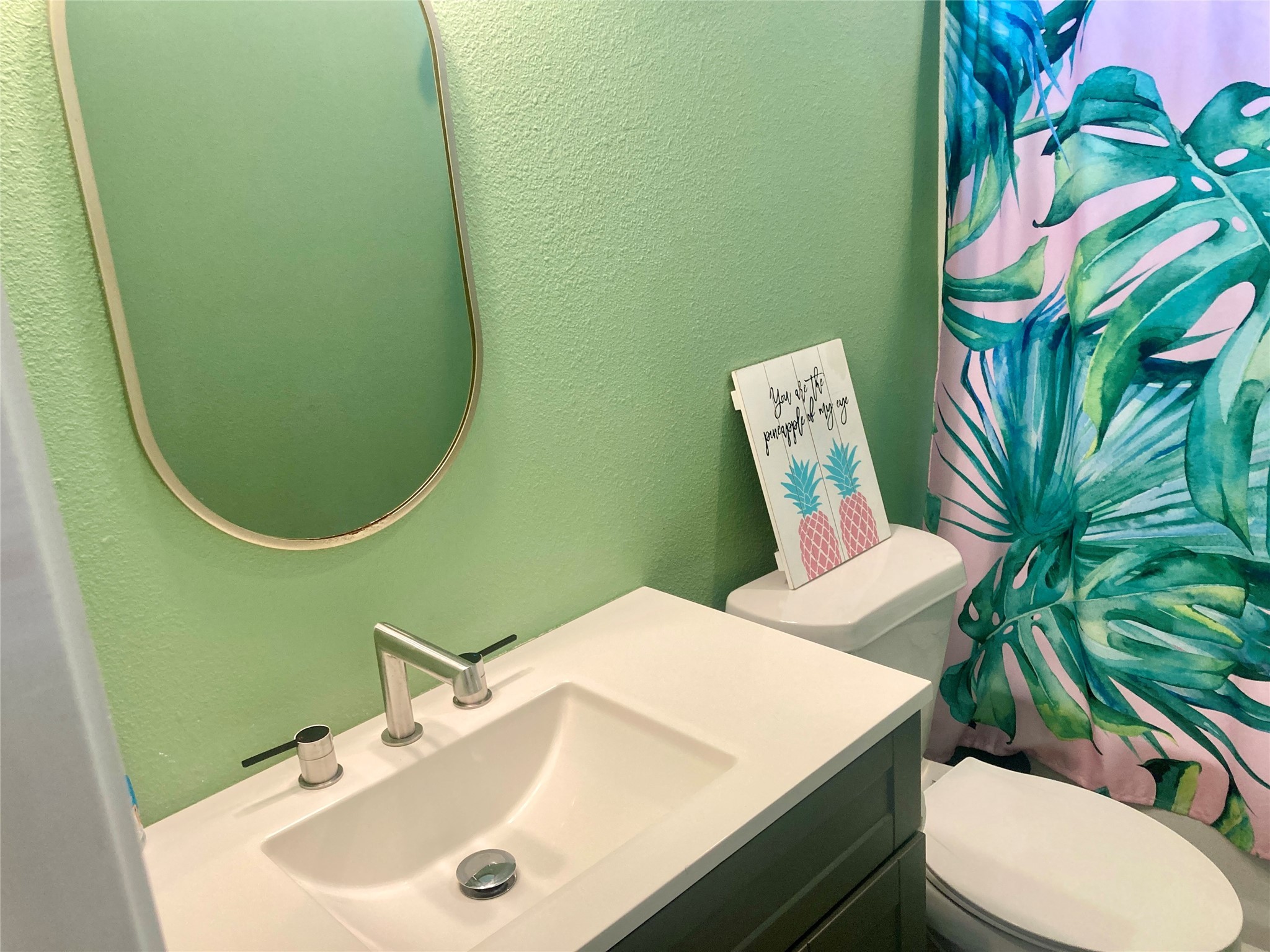 1830 Croaker Lane Crystal Beach, TX 77650 - Photo 12 of 21 a bathroom with a sink a toilet and mirror