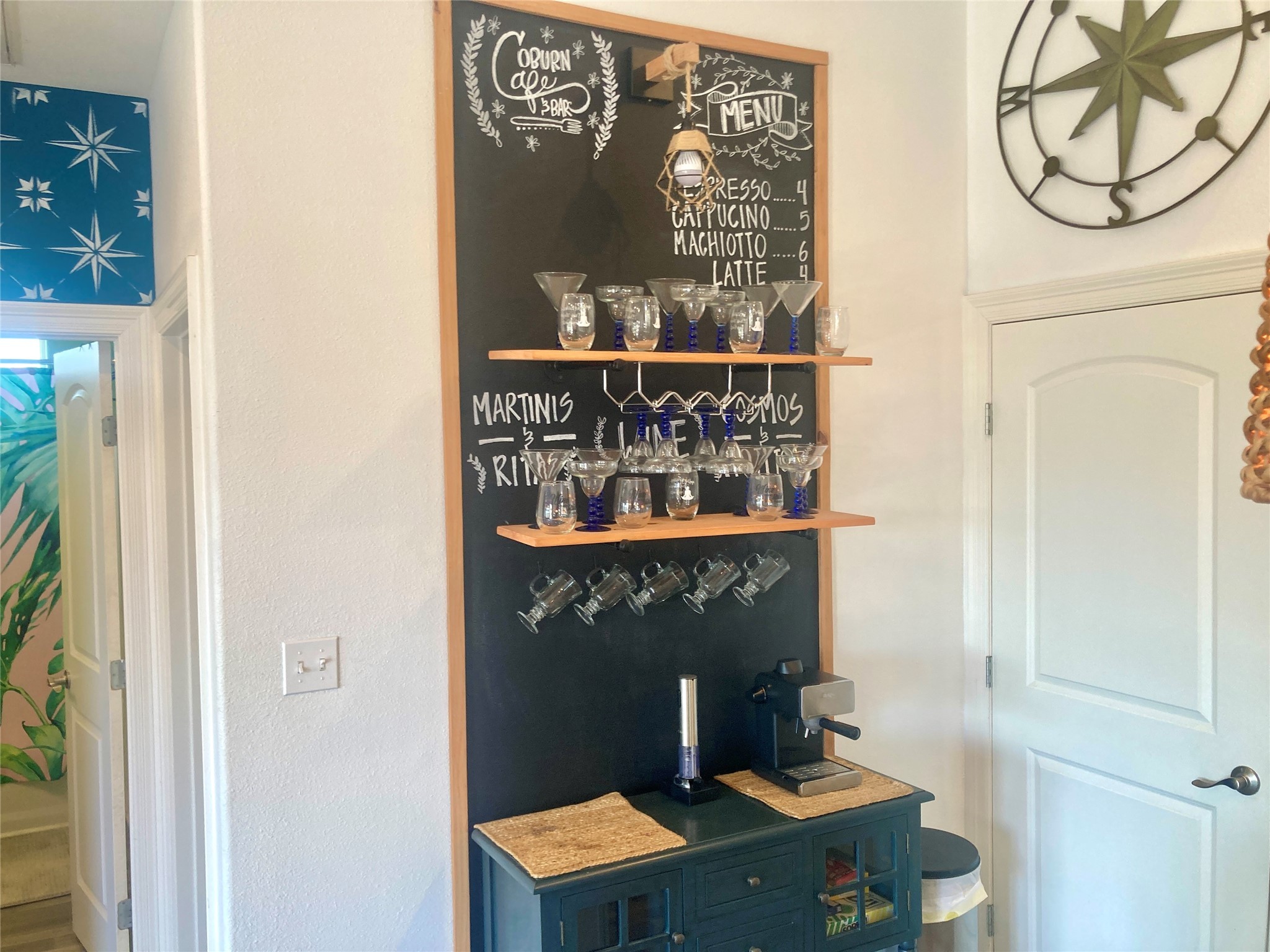 1830 Croaker Lane Crystal Beach, TX 77650 - Photo 14 of 21 a table with wine bottles and glasses on it