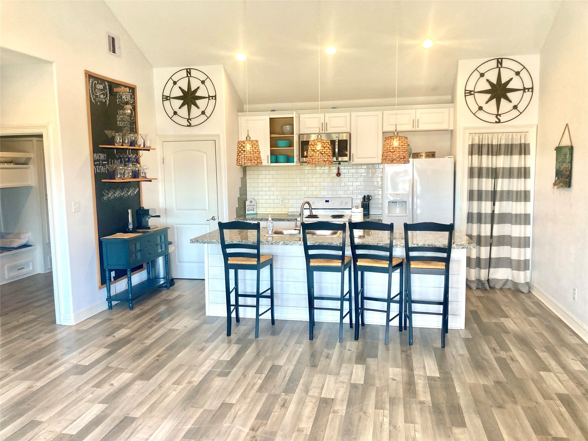 1830 Croaker Lane Crystal Beach, TX 77650 - Photo 3 of 21 a dining room with furniture and a floor to ceiling window