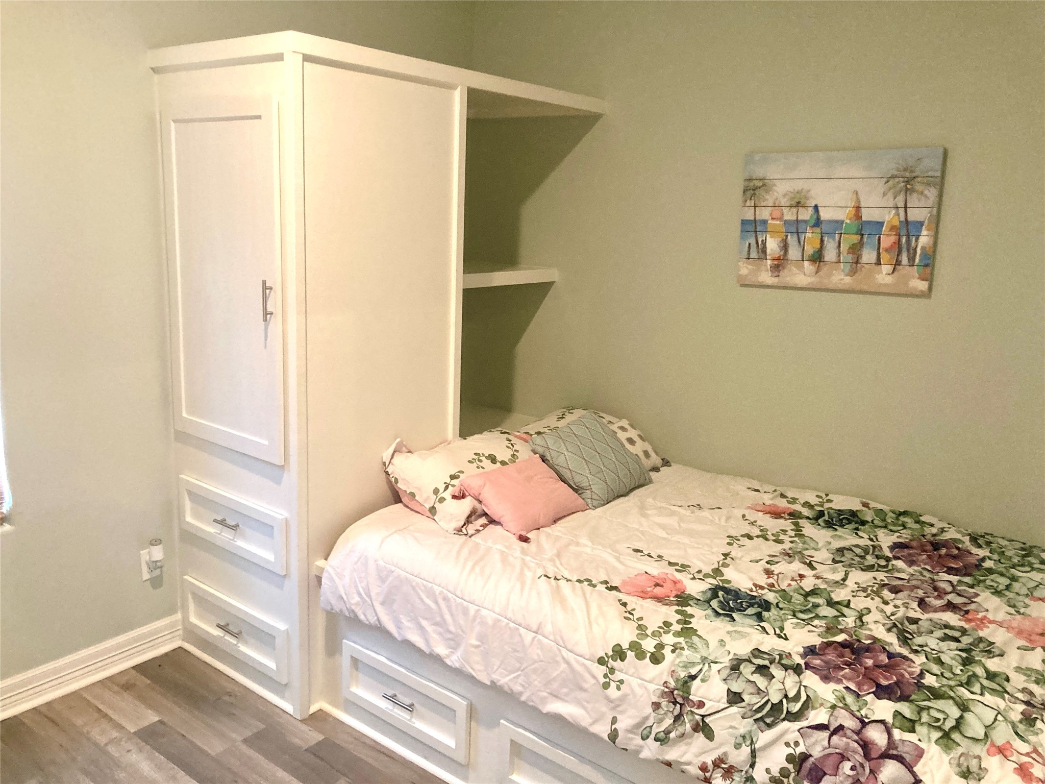 1830 Croaker Lane Crystal Beach, TX 77650 - Photo 8 of 21 a bedroom with a bed and a window