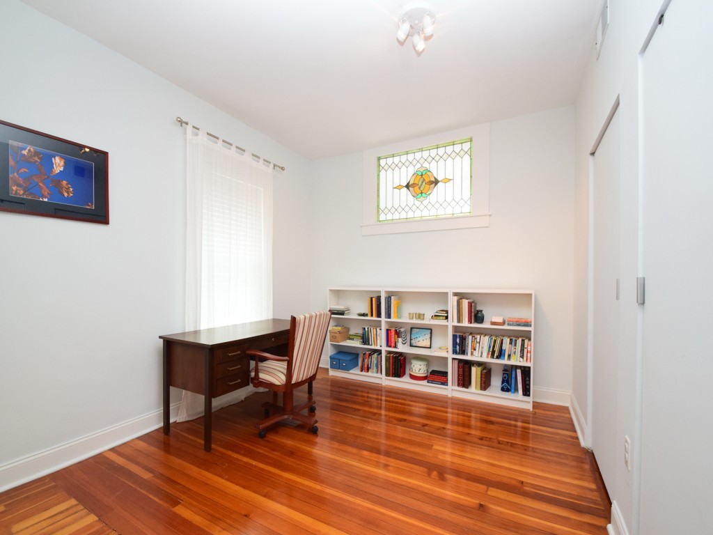 78 Montebello Road, Unit 3 Boston, MA 02130 - Photo 13 of 19 a view of a workspace with furniture and wooden floor