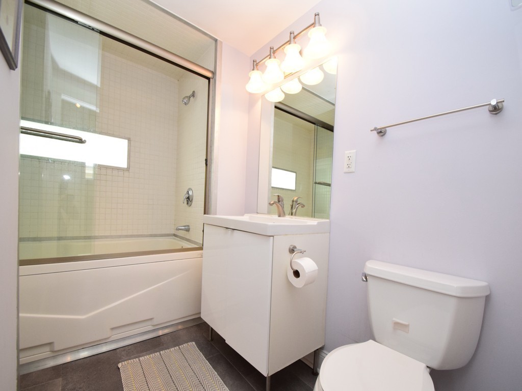 78 Montebello Road, Unit 3 Boston, MA 02130 - Photo 16 of 19 a bathroom with a sink a toilet and shower