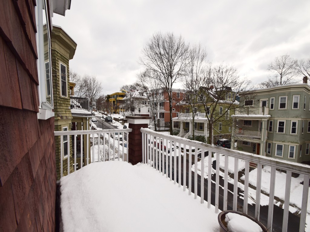 78 Montebello Road, Unit 3 Boston, MA 02130 - Photo 18 of 19 a view of a house with a deck
