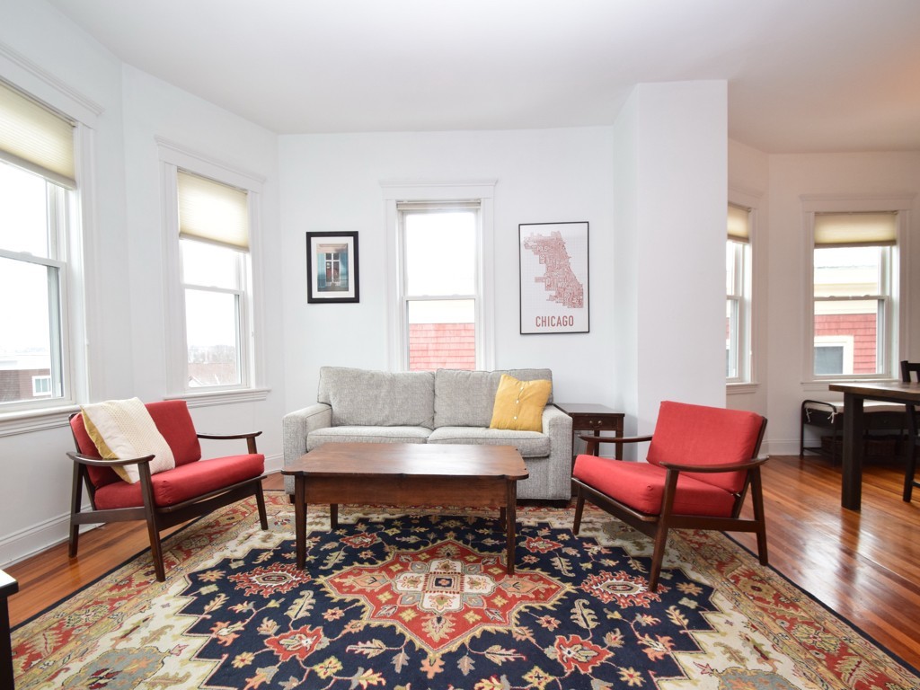 78 Montebello Road, Unit 3 Boston, MA 02130 - Photo 2 of 19 a living room with furniture and a window