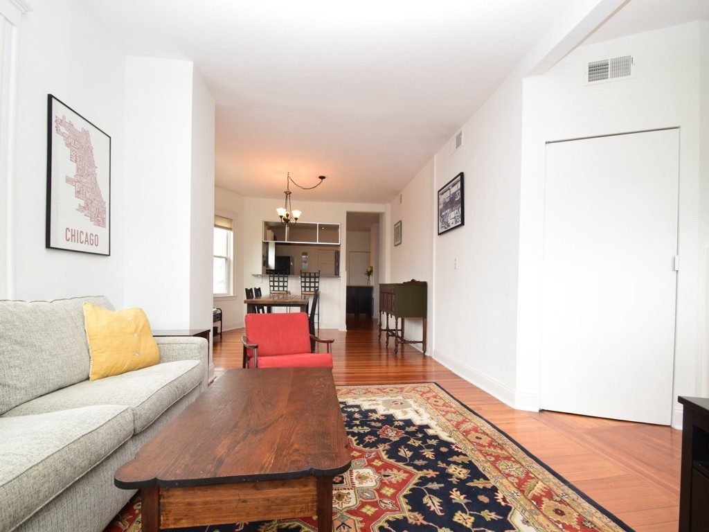 78 Montebello Road, Unit 3 Boston, MA 02130 - Photo 5 of 19 a living room with furniture and wooden floor
