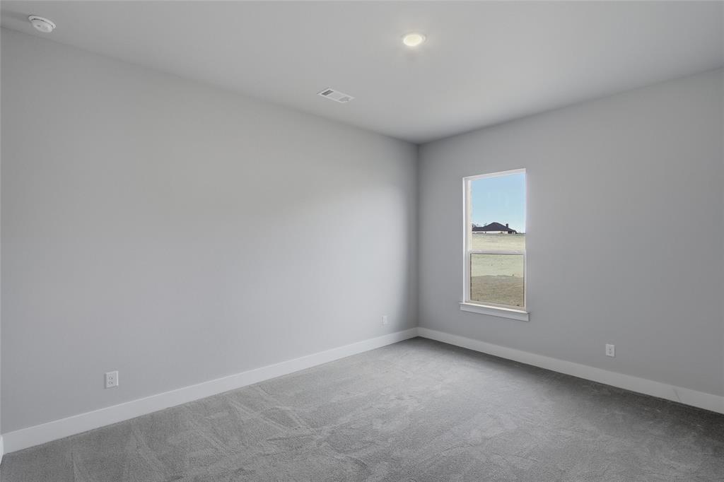 812 Vly Rdg Road Van Alstyne, TX 75495 - Photo 25 of 33 an empty room with a window