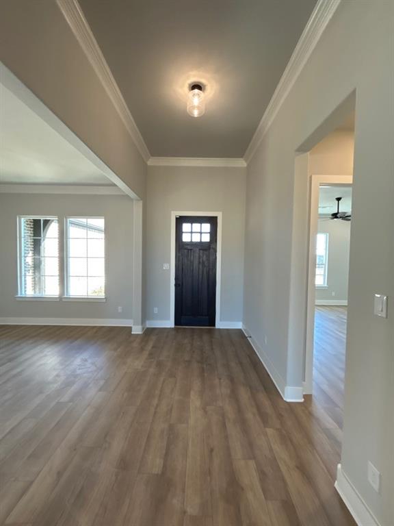 812 Vly Rdg Road Van Alstyne, TX 75495 - Photo 3 of 20 wooden floor in an empty room