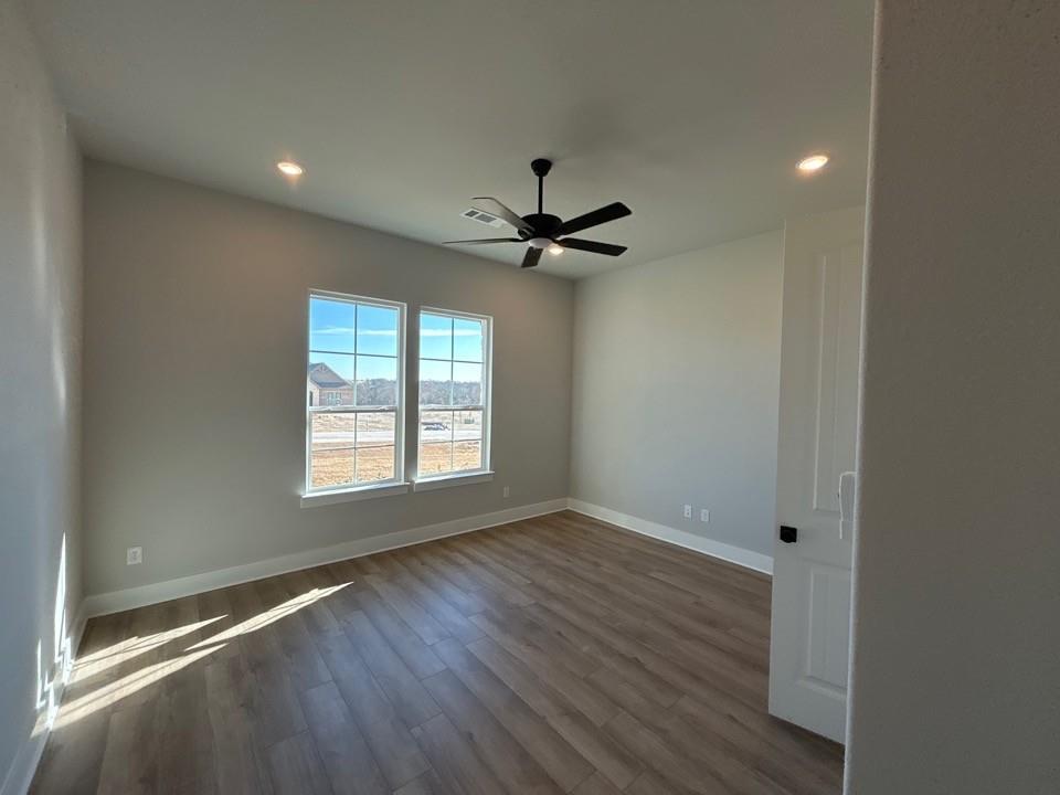 812 Vly Rdg Road Van Alstyne, TX 75495 - Photo 6 of 20 a view of an empty room with a window