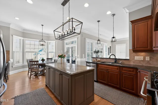 a view of a chair and table in the balcony