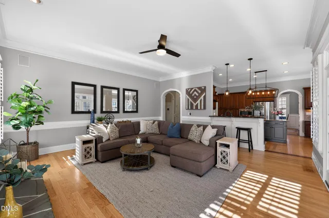 a bathroom with a sink a toilet a shower and a mirror