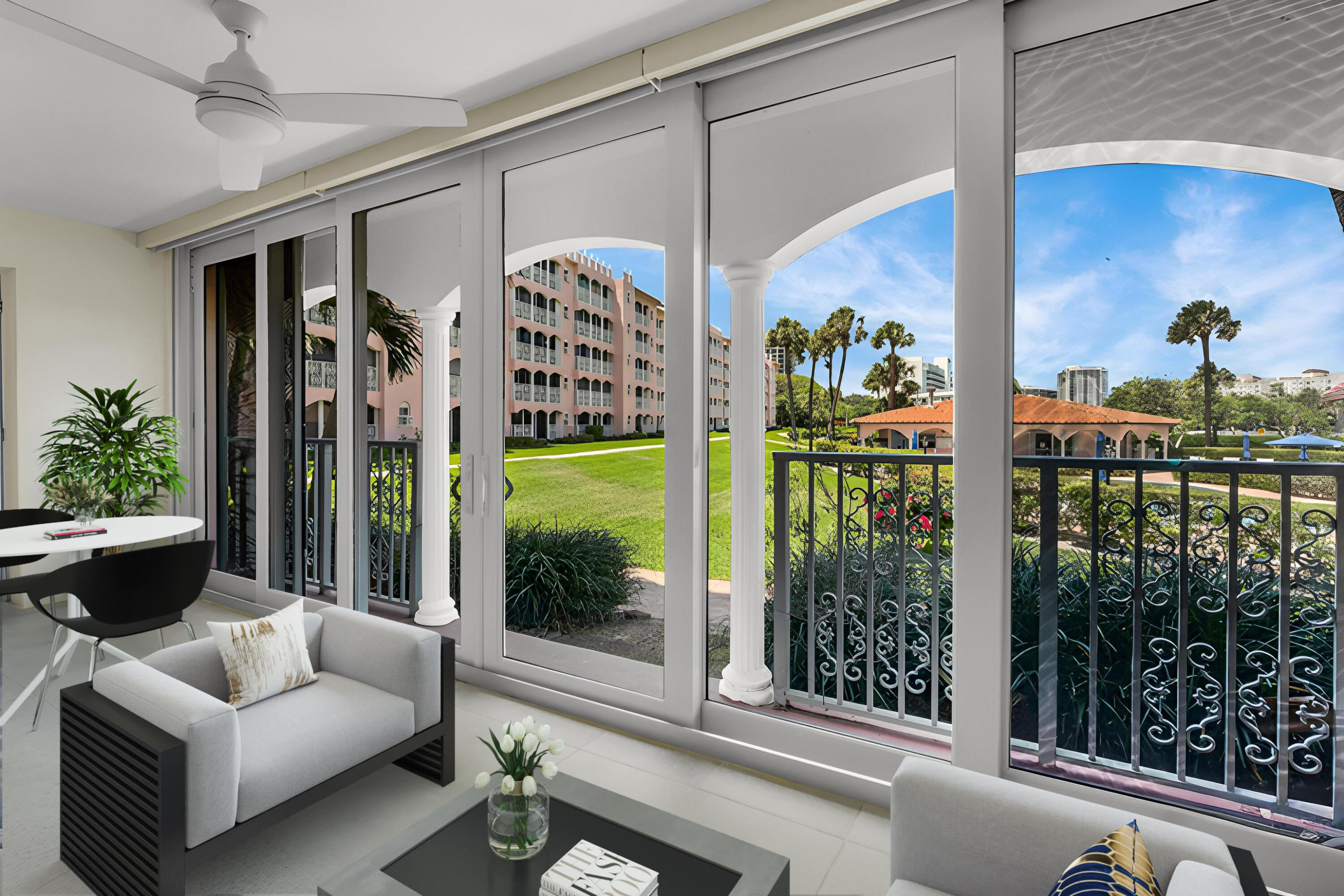 1099 South Ocean Boulevard, Unit 105 Boca Raton, FL 33432 - Photo 17 of 30 a living room with furniture and a floor to ceiling window