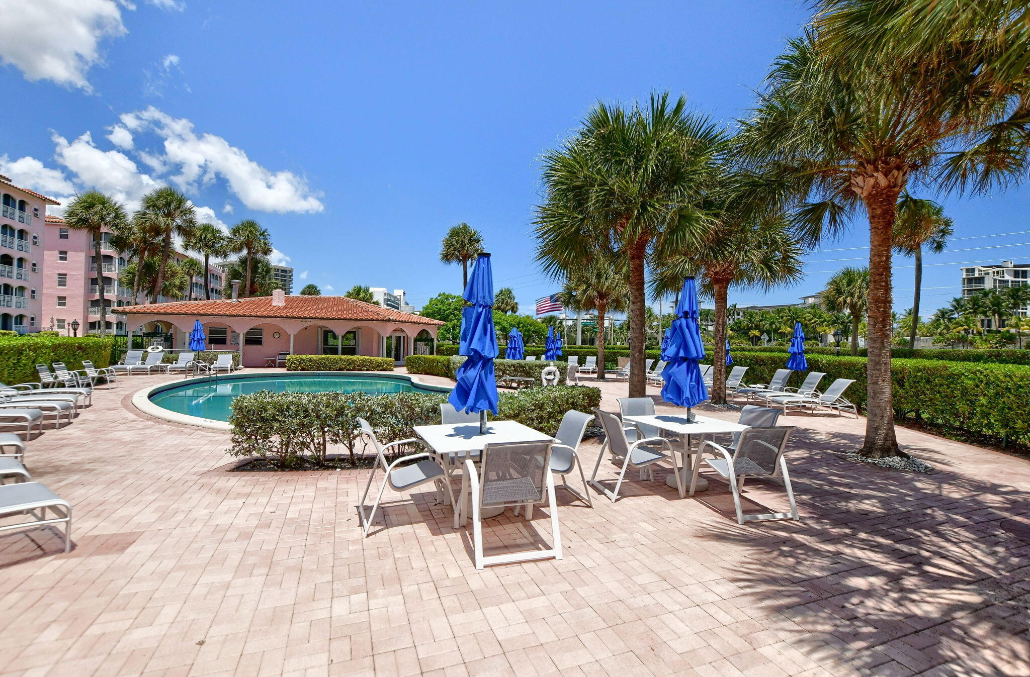 1099 South Ocean Boulevard, Unit 105 Boca Raton, FL 33432 - Photo 30 of 30 a view of a chairs and table in the patio