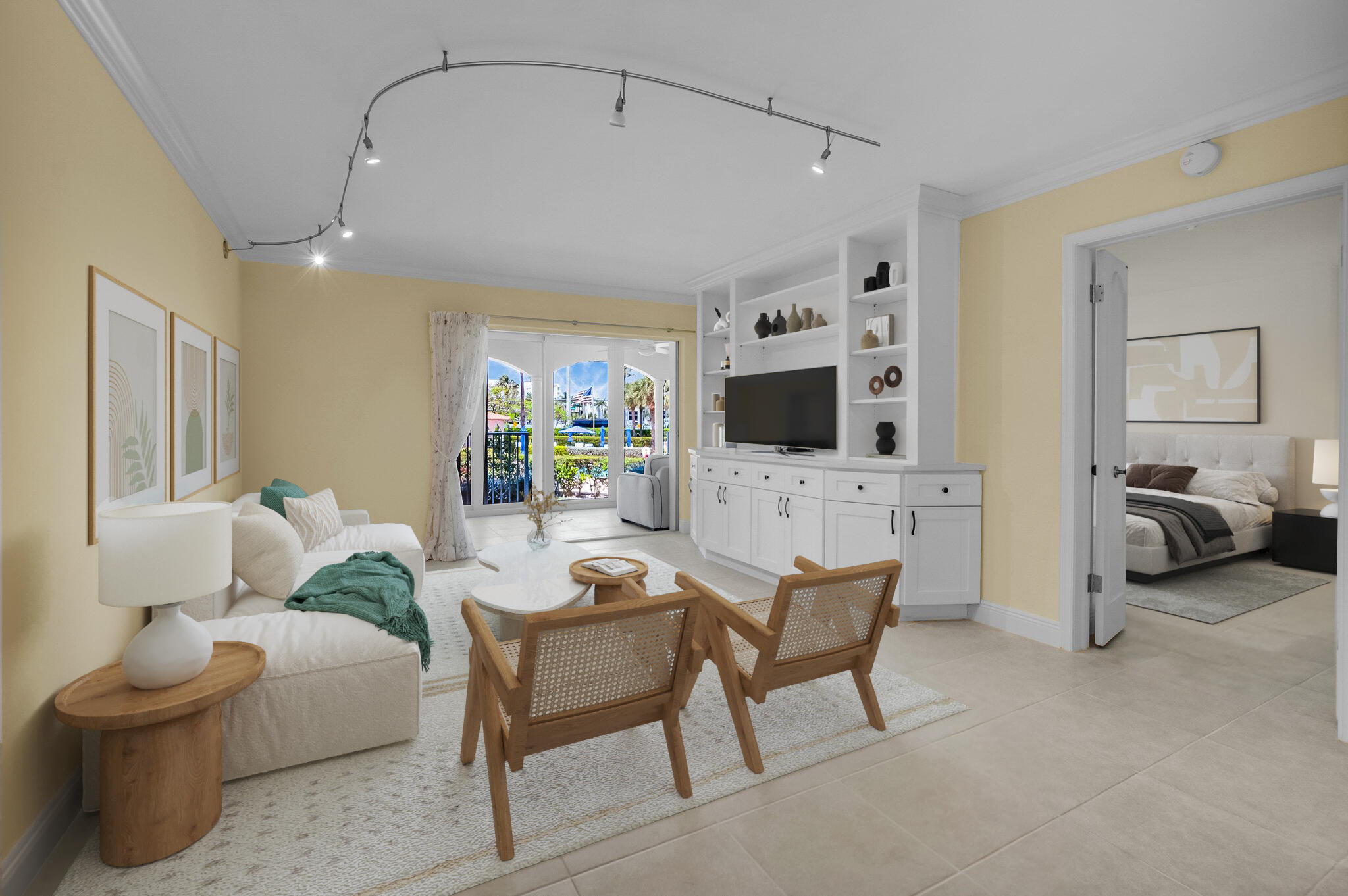 1099 South Ocean Boulevard, Unit 105 Boca Raton, FL 33432 - Photo 9 of 30 a living room with furniture and a flat screen tv