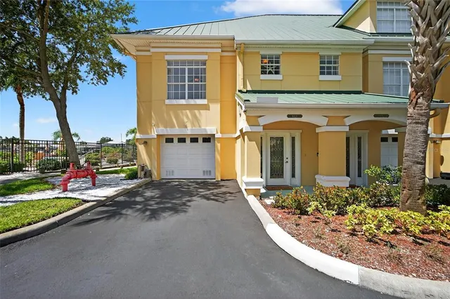 a view of a balcony with a floor to ceiling window and wooden floor