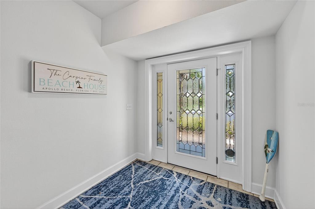 6428 Sunset Bay Circle Apollo Beach, FL 33572 - Photo 11 of 90 a view of an entryway with wooden floor