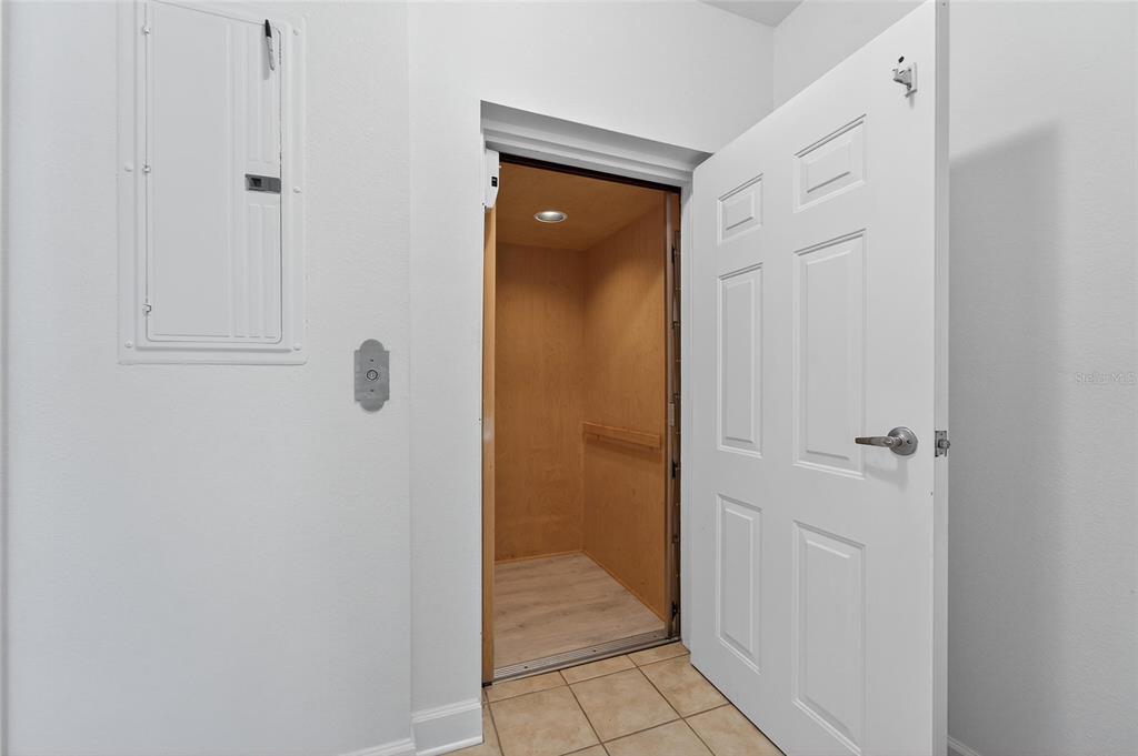 6428 Sunset Bay Circle Apollo Beach, FL 33572 - Photo 13 of 90 a view of a bathroom from a hallway