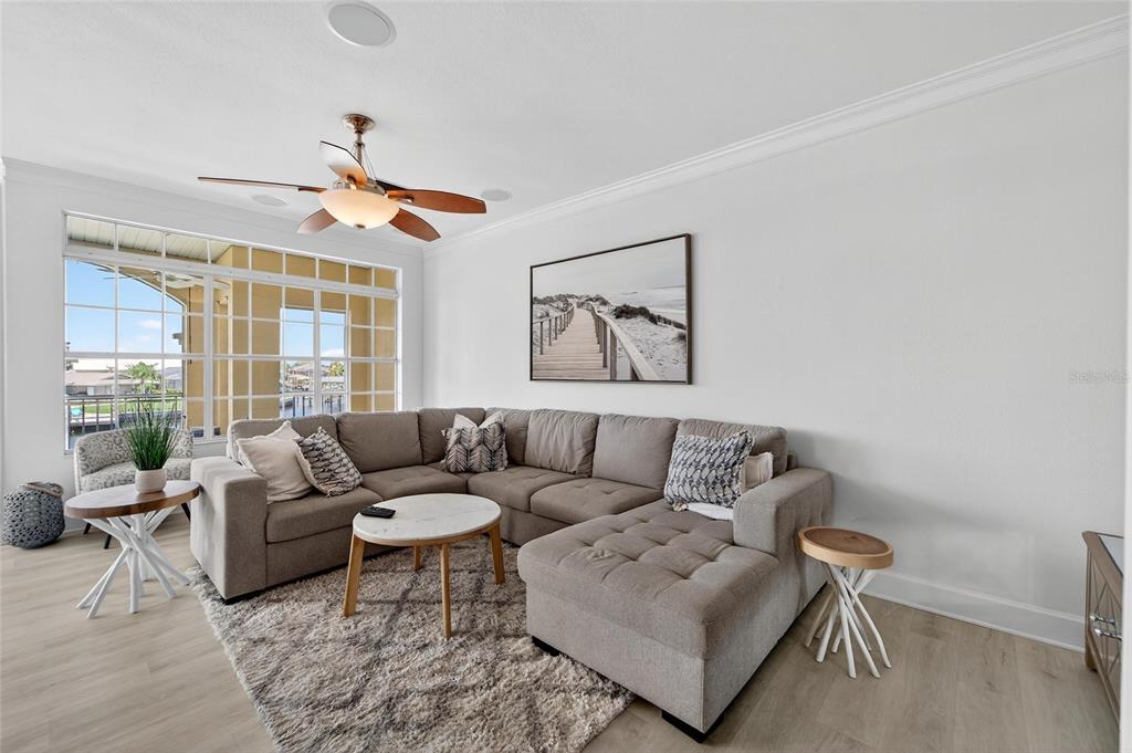6428 Sunset Bay Circle Apollo Beach, FL 33572 - Photo 17 of 90 a living room with furniture and a window