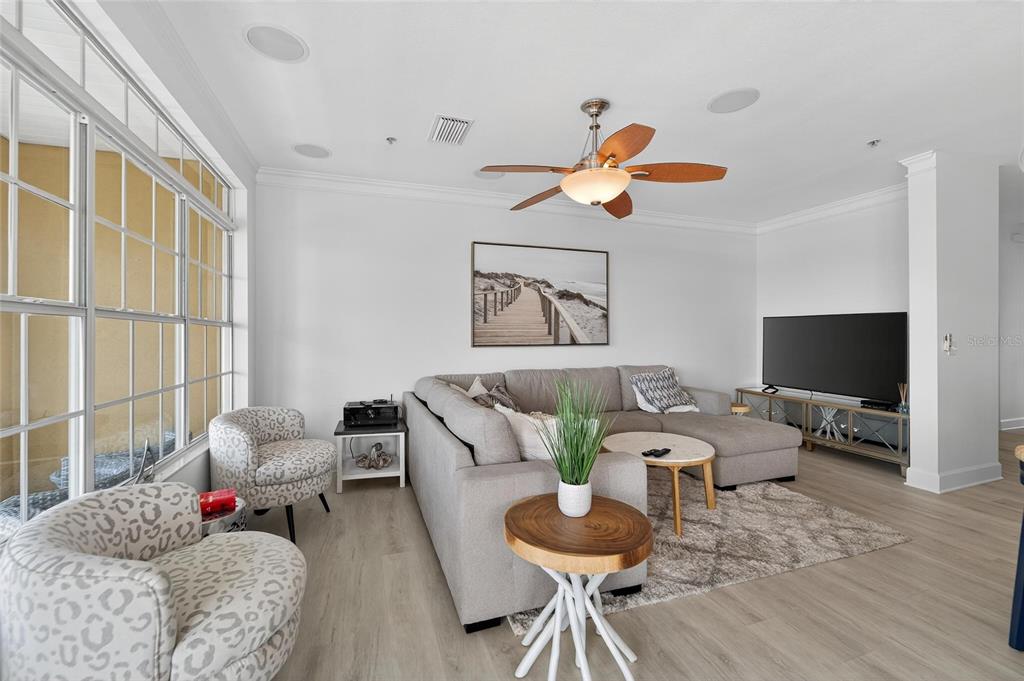 6428 Sunset Bay Circle Apollo Beach, FL 33572 - Photo 18 of 90 a living room with furniture and a flat screen tv