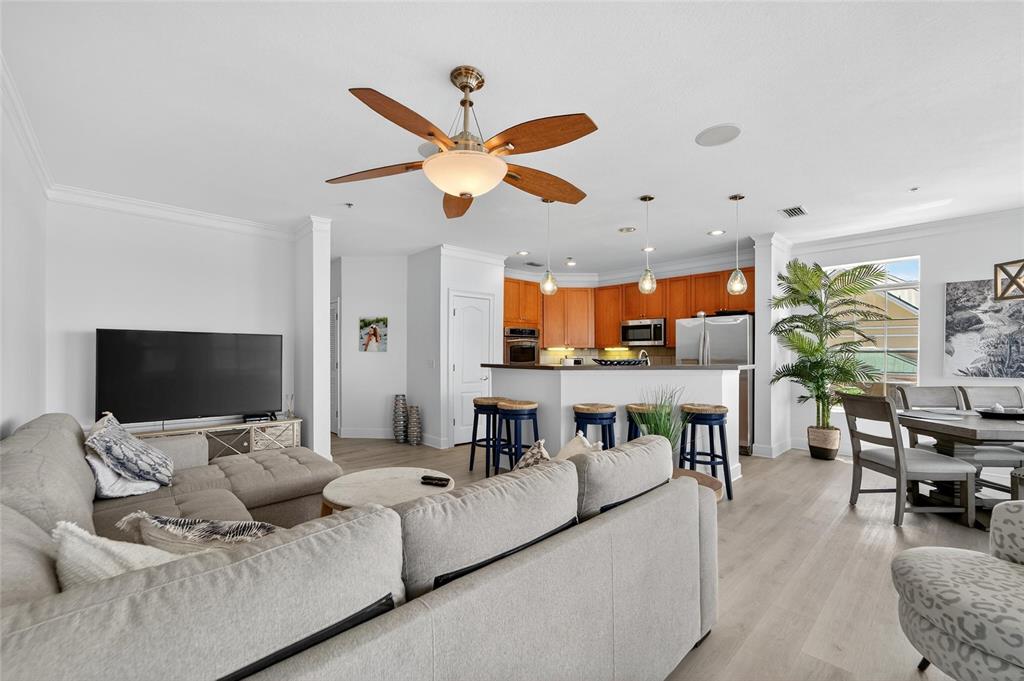 6428 Sunset Bay Circle Apollo Beach, FL 33572 - Photo 19 of 90 a living room with furniture and a flat screen tv