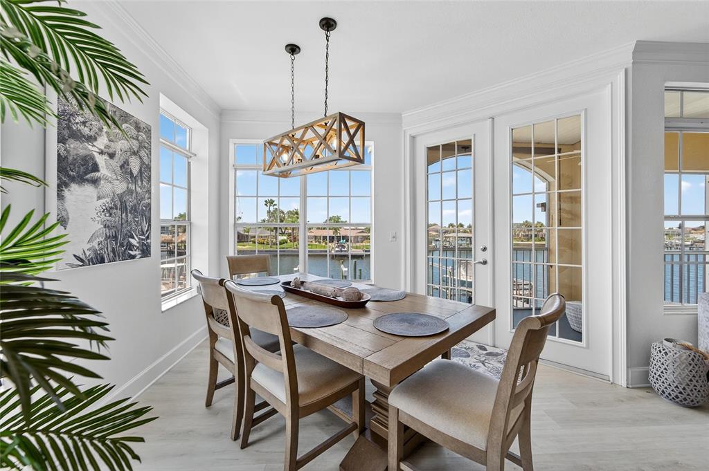 6428 Sunset Bay Circle Apollo Beach, FL 33572 - Photo 21 of 90 a view of a dining room with furniture window and outside view