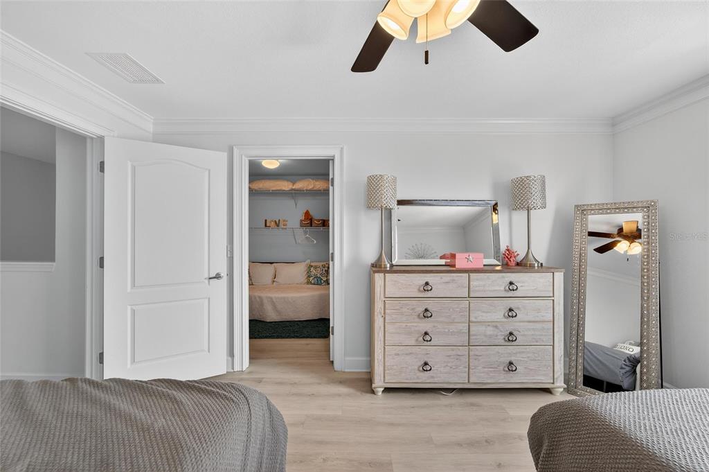 6428 Sunset Bay Circle Apollo Beach, FL 33572 - Photo 48 of 90 a bedroom with a bed and furniture