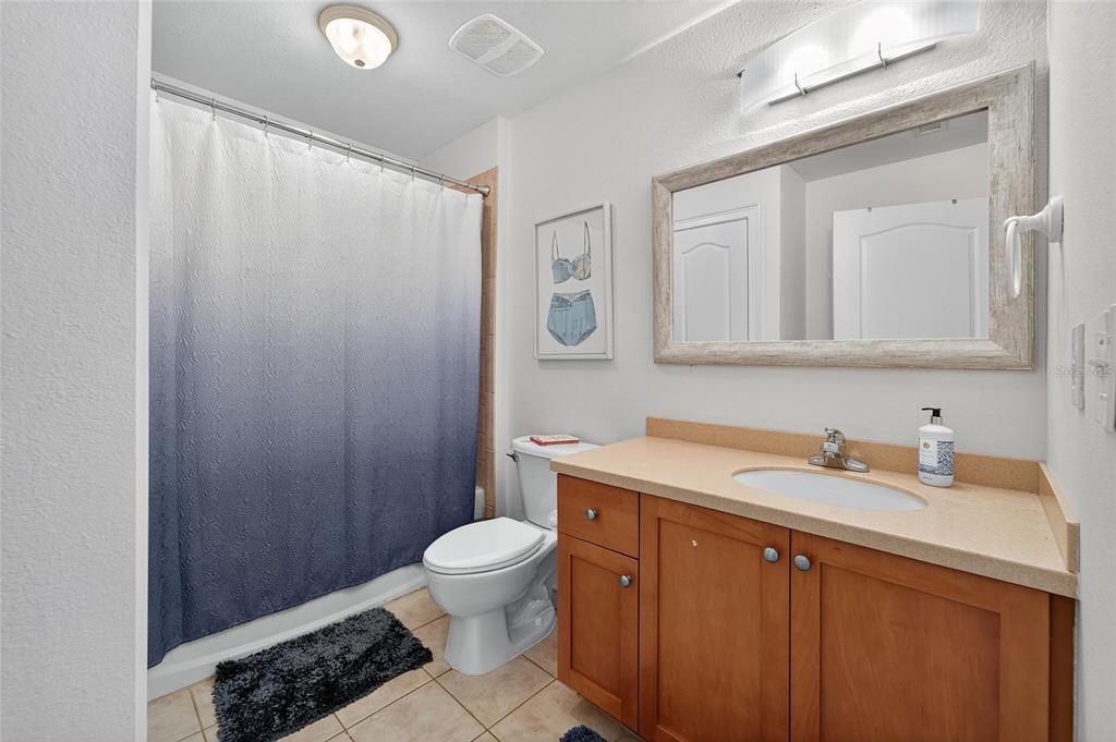 6428 Sunset Bay Circle Apollo Beach, FL 33572 - Photo 51 of 90 a bathroom with a sink a toilet and shower